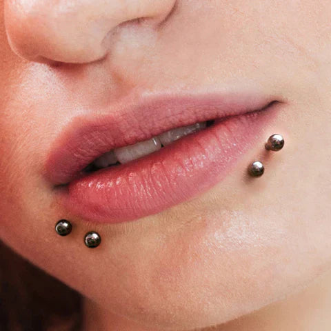 Piercing Shark Bites : Adoptez un style audacieux et symétrique